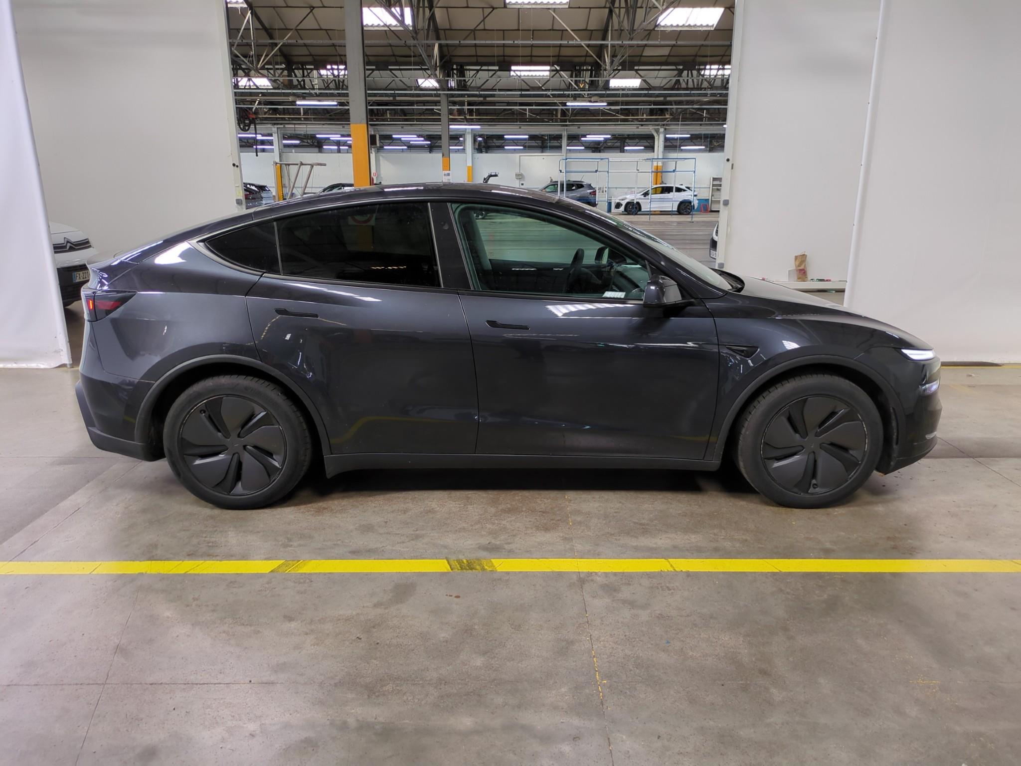 TESLA  2025